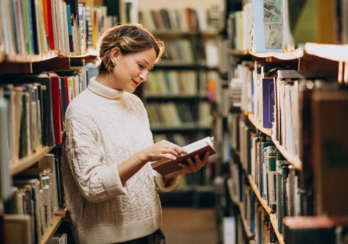 young-woman-studying-library